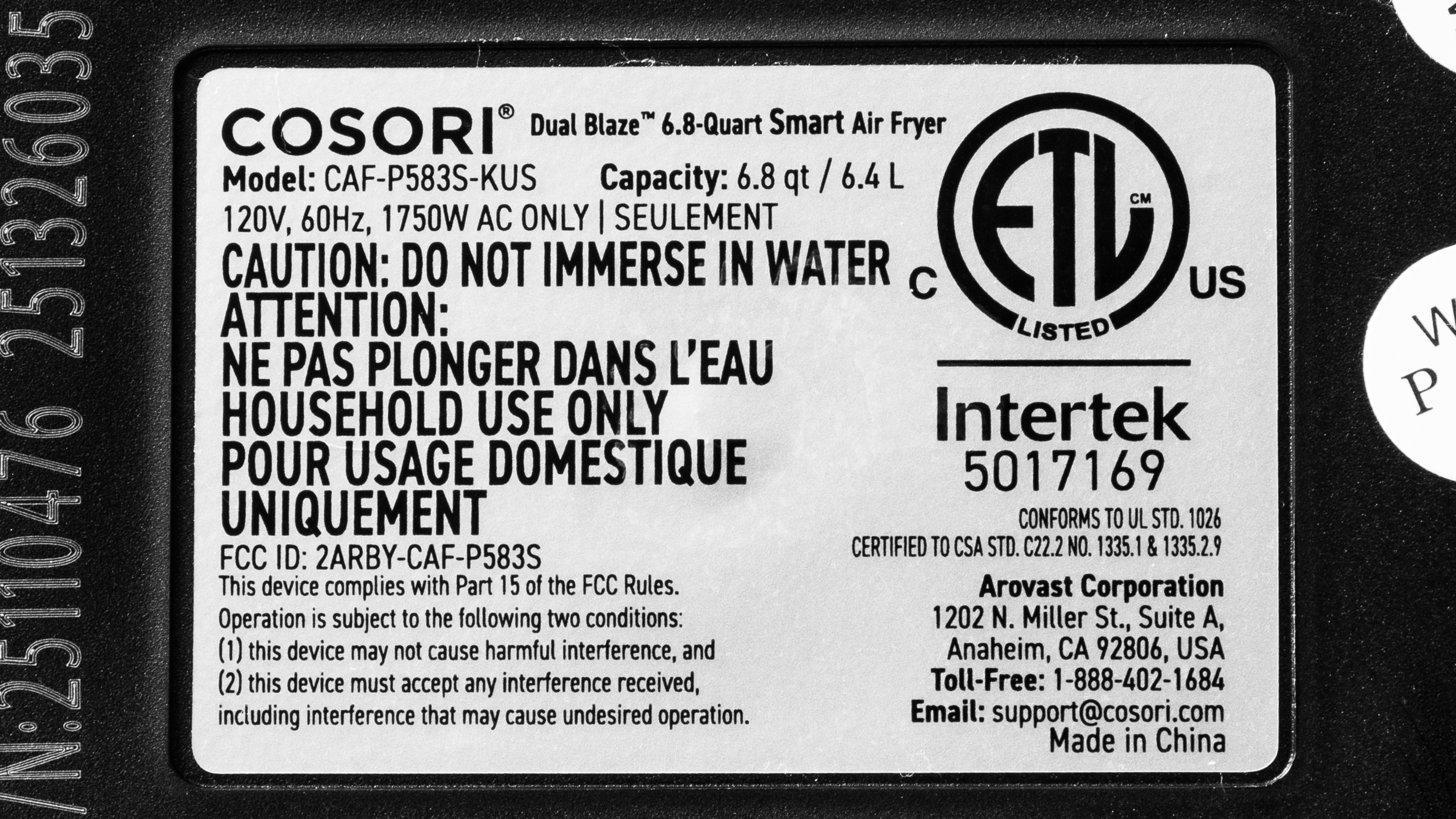 A model and serial number label on the underside of an air fryer base showing where the model number is printed